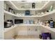 Spacious walk-in pantry with ample shelving for storing various kitchen essentials at 201 S Ennis St, Fuquay Varina, NC 27526