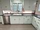 Bright kitchen featuring plenty of counter space, stainless steel appliances, and natural light at 207 Wood Cir, Chapel Hill, NC 27514
