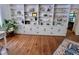 Hardwood floors and built-in bookshelves add architectural interest to the room at 207 Wood Cir, Chapel Hill, NC 27514