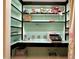Bright, organized office space with built-in shelves and a desk perfect for working from home at 207 Wood Cir, Chapel Hill, NC 27514