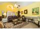 Spacious living room featuring vaulted ceilings, ample natural light, and stylish furnishings at 229 Hocutt Farm Dr, Clayton, NC 27527