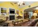 Comfortable living room with fireplace, vaulted ceilings, and open floor plan at 229 Hocutt Farm Dr, Clayton, NC 27527