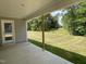 Backyard featuring a large manicured lawn at 265 Eason Creek Way, Clayton, NC 27527