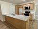 Kitchen with stainless steel appliances, granite countertops, and custom cabinets at 265 Eason Creek Way, Clayton, NC 27527
