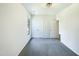 Bright bedroom features a closet, a bright window, and plush carpet at 27 Stonewall Way, Durham, NC 27704