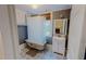 Charming bathroom featuring a vintage clawfoot tub and patterned tile flooring at 29 Oak St, Roxboro, NC 27573