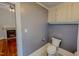 This bathroom has built-in cabinets and a toilet at 29 Oak St, Roxboro, NC 27573