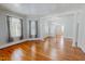 Spacious living room features hardwood floors, high ceilings, and abundant natural light at 29 Oak St, Roxboro, NC 27573
