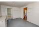Bright room with whitewashed wood paneling and hardwood flooring at 29 Oak St, Roxboro, NC 27573