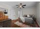 Staged bedroom features wood floors, contemporary furniture and decor, and neutral color scheme at 301 Williamson St, Burlington, NC 27215