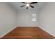Bright bedroom featuring hardwood floors, a ceiling fan and a window for natural light at 301 Williamson St, Burlington, NC 27215