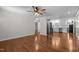 View of the open concept living room that flows into the kitchen with stainless steel appliances at 301 Williamson St, Burlington, NC 27215
