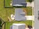 Aerial view of the property showcasing the layout, backyard, and surrounding neighborhood at 302 Slate Dr, Gibsonville, NC 27249