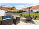 Outdoor patio with a table and chairs, comfortable seating, a BBQ and a fenced yard at 302 Slate Dr, Gibsonville, NC 27249