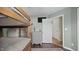 This bedroom includes a bunk bed and grey dresser, as well as a doorway to other rooms at 302 Slate Dr, Gibsonville, NC 27249
