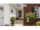 Inviting front porch with decorative details and a welcoming entrance at 302 Slate Dr, Gibsonville, NC 27249