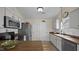 Charming kitchen with wood countertops, subway tile backsplash, and stainless steel appliances at 302 Slate Dr, Gibsonville, NC 27249