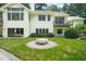 Spacious backyard with a fire pit area, perfect for outdoor entertaining at 3707 Stonegate Dr, Chapel Hill, NC 27516