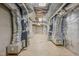 Unfinished basement with exposed ductwork, ample space, and potential for customization at 3707 Stonegate Dr, Chapel Hill, NC 27516