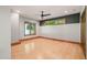 Bright bedroom features natural light, wood flooring, neutral walls, and stylish accents at 3707 Stonegate Dr, Chapel Hill, NC 27516
