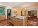 Spacious kitchen island with granite countertops and modern appliances provides a chef's dream at 3707 Stonegate Dr, Chapel Hill, NC 27516