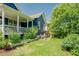 Charming backyard with lush green lawn and patio seating, perfect for relaxing and outdoor enjoyment at 41 Highveld Ave, Chapel Hill, NC 27516