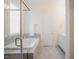 Bathroom features a soaking tub, glass shower, and a double sink vanity at 41 Highveld Ave, Chapel Hill, NC 27516