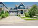 Charming navy blue home featuring a two-car garage and beautifully landscaped front yard at 41 Highveld Ave, Chapel Hill, NC 27516