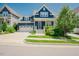 Inviting two-story home featuring a well-manicured lawn, a two-car garage and a cozy front porch at 41 Highveld Ave, Chapel Hill, NC 27516