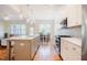 Modern kitchen with white cabinets, stainless steel appliances, and a center island with seating at 41 Highveld Ave, Chapel Hill, NC 27516