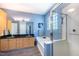 This spacious bathroom has double sinks, soaking tub, and glass shower at 413 Great Smokey Mountain Dr, Mebane, NC 27302