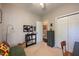 Functional bedroom featuring a cozy lounge area and storage solutions at 413 Great Smokey Mountain Dr, Mebane, NC 27302