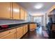 Modern kitchen with granite countertops and stainless steel appliances at 413 Great Smokey Mountain Dr, Mebane, NC 27302