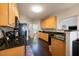 Functional kitchen with granite counters and stainless steel appliances at 413 Great Smokey Mountain Dr, Mebane, NC 27302