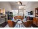 Spacious living room enhanced by a vaulted ceiling, ample seating, and natural light from large windows at 413 Great Smokey Mountain Dr, Mebane, NC 27302