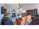 Inviting living room with a fireplace and large windows, offering a bright and comfortable living space at 413 Great Smokey Mountain Dr, Mebane, NC 27302
