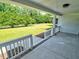 Spacious covered front porch perfect for relaxing with views of the lush green lawn at 4414 Nc Hwy 87 N, Pittsboro, NC 27312