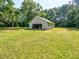 Detached garage with ample storage space and convenient access to the spacious backyard at 4414 Nc Hwy 87 N, Pittsboro, NC 27312
