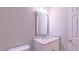 Bathroom with a granite countertop and a white sink at 4928 Silverdene St, Raleigh, NC 27616
