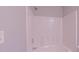 Clean white stand up shower featuring a modern design with a shower caddy at 4928 Silverdene St, Raleigh, NC 27616