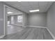 Finished basement with a sliding door and access to other rooms at 500 Walcott Way, Cary, NC 27519