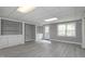 Spacious finished basement area featuring recessed lighting, neutral paint and built-in storage at 500 Walcott Way, Cary, NC 27519