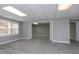 Finished basement featuring resilient floors and a sliding door room divider at 500 Walcott Way, Cary, NC 27519