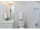 Inviting bathroom with a shower/tub combo, white fixtures, and modern lighting at 500 Walcott Way, Cary, NC 27519