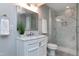 Beautiful bathroom featuring a marble shower, brushed nickel hardware, and modern vanity at 500 Walcott Way, Cary, NC 27519