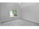 Bright bedroom with a ceiling fan, and a neutral color palette at 500 Walcott Way, Cary, NC 27519
