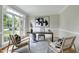 Bright office with large window, elegant desk, and neutral tones at 500 Walcott Way, Cary, NC 27519