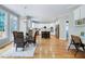 Bright kitchen and breakfast nook with hardwood floors and outdoor access at 500 Walcott Way, Cary, NC 27519
