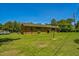 Charming brick ranch with a large yard and mature trees at 605 Sagefield Way, Henderson, NC 27537