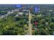 An aerial view shows the home's location relative to downtown Mebane and Holt Street Park at 605 W Holt St, Mebane, NC 27302